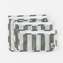 Load image into Gallery viewer, Roamio by Bumkins Clear Travel Bag 3 Pack: Clubhouse Stripe lays overlapped on a white background.
