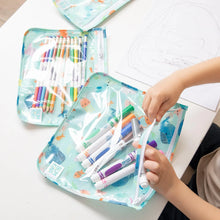 Load image into Gallery viewer, A child organizes colorful markers in Bumkins Clear Travel Bag 3-Pack: Ocean Life on a white table.
