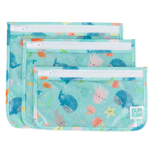 Load image into Gallery viewer, Bumkins Clear Travel Bag 3-Pack: Ocean Life includes 3 TSA-friendly aqua bags with ocean-themed prints made of waterproof fabric.
