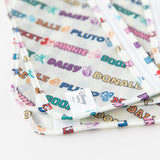 Close-up Bumkins Clear Travel Bag 3 Pack: Mickey & Friends Varsity, showcasing the Disney Baby logo label.
