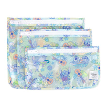 Load image into Gallery viewer, Bumkins Clear Travel Bag 3 Pack: Aloha Stitch includes 3 TSA-compliant pouches with tropical cartoon designs featuring Disney's Stitch.
