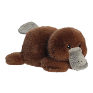 Aurora Puck Platypus 10" is a plush brown toy with a gray bill, gray feet, and black eyes, lying on its stomach.