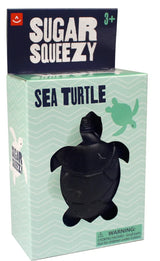 Aurora Sugar Squeezy Sea Turtle squishy toy, ages 3+, mint green box, cute turtle art, stress relief, includes warning label.
