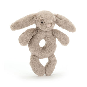 Jellycat Beige Bunny Ring Rattle: plush, soft baby toy with floppy ears and stitched face—adorable and perfect for little hands.
