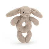 Jellycat Beige Bunny Ring Rattle: plush, soft baby toy with floppy ears and stitched face—adorable and perfect for little hands.