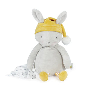 Plush, Sleepy Bloom Bunny: gray bunny stuffed animal with yellow hat and legs, and white & gray polka dot blanket.