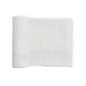 A white Little Unicorn Organic Cotton Muslin Swaddle Blanket is folded flat against a plain white background.