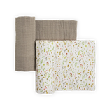 Two Little Unicorn Organic Cotton Muslin Swaddles—gray and floral—folded neatly on a white background.