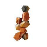 Geo Stacking Rocks by PlanToys are colorful, sustainable wooden blocks that develop fine motor skills when balanced vertically.