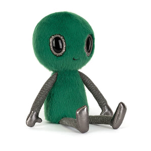 Jellycat Zyllan Alien: a green plush with big black eyes, silver bendy limbs, and a little smile, sits upright.