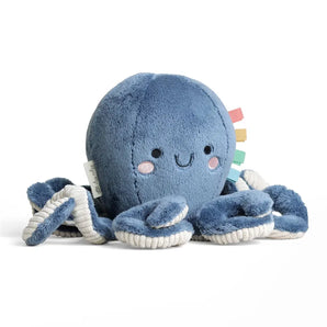Itzy Ritzy Sweetie Snuggles Octopus: plush blue toy with ribbon tags—great for sensory play and comfort.