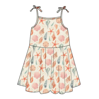 The Emerson and Friends Sundress, Sandy Seashells, is buttery soft bamboo with thin shoulder ties.