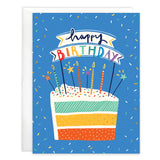 Gina B Designs Birthday Card featuring a slice of layered cake with candles and a Happy Birthday banner on a blue confetti background.