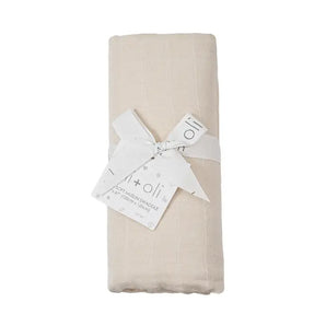 A rolled Bamboo Swaddle in Vanilla Cream by Ali and Oli, tied with a white ribbon and a branded tag.