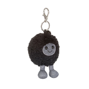 Jellycat Bag Charm Amuseables Black Hole: round, black, fluffy plush with gray smiley face, gray legs & metal clasp.