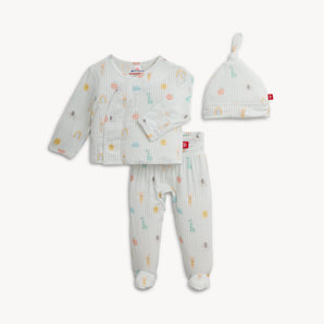 The Magnetic Me Kimono Lullaby Blue set features breathable modal, a wrap-style top, footed pants, and a matching knot hat.