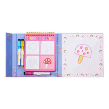 Load image into Gallery viewer, Open the Learn to Draw, Rainbow Fairy kit by Floss and Rock with a mushroom sketchbook, markers, and drawing steps; finished art on right.
