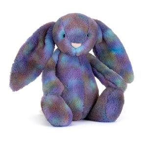Jellycat Zodihop Luxe Bunny plush with long floppy ears, soft purple, blue & green tie-dye fur, sits upright.