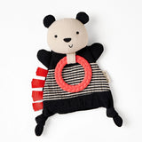 Itzy Ritzy Sensory Toy w/ Teether, Panda—striped body, crinkle features, ribbon tags & knots on white background.