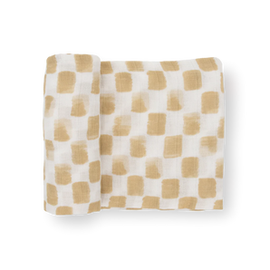 Little Unicorn Cotton Swaddle, Adobe Checker: white muslin with hand-painted style brown grid squares, perfect for baby.