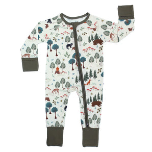 Sleeper, In the Woods: white long sleeve pajamas with woodland animal & tree print, green cuffs, & front zipper; made of bamboo viscose.