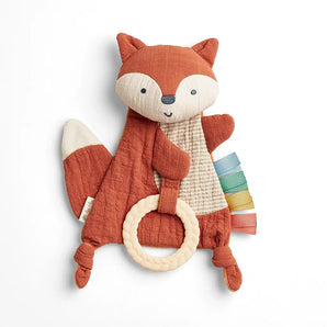 Itzy Ritzy Sensory Toy w/ Teether, Fox: features a cream teether and colorful ribbon tags, shown on a white background.