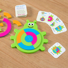 Load image into Gallery viewer, The Bugzzle Game by Fat Brain Toy Co features colorful bug-shaped puzzle pieces and instruction cards for a playful brain challenge.
